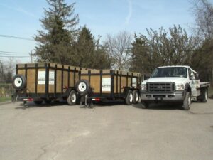 A truck and trailer in the parking lot