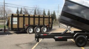 A dump truck is parked in the parking lot.